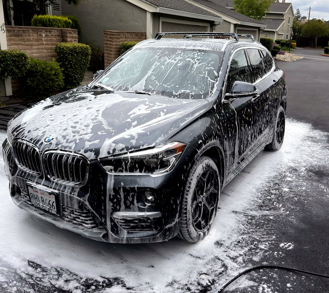 A BMW under snow foam